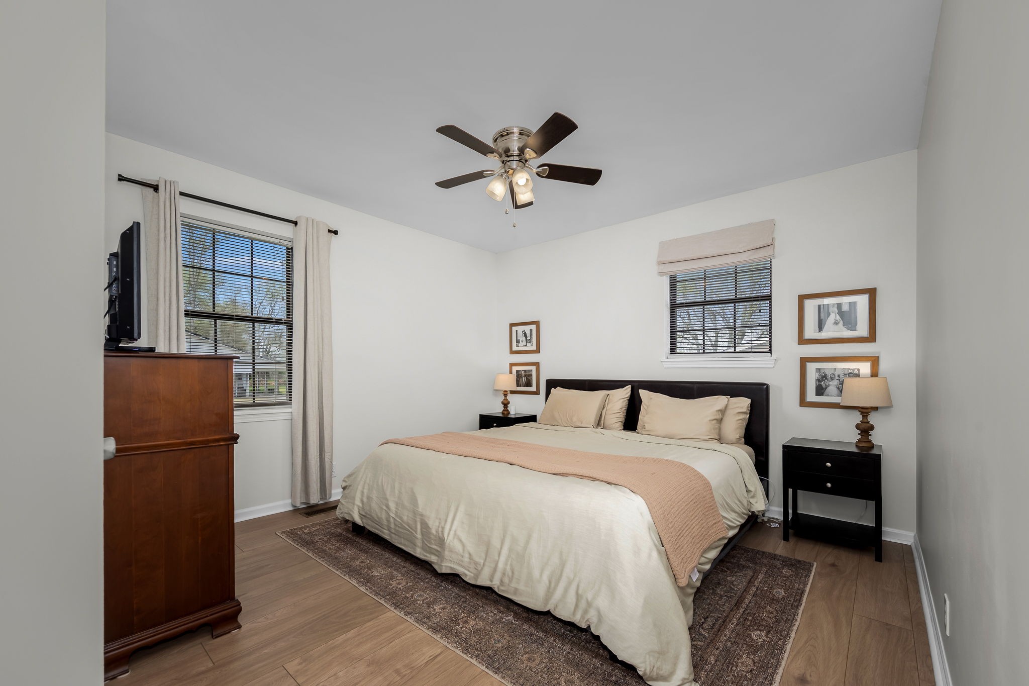 210 Sunset Street Unionville, TN 37180 - Photo 23 of 48 a bedroom with a bed and a refrigerator