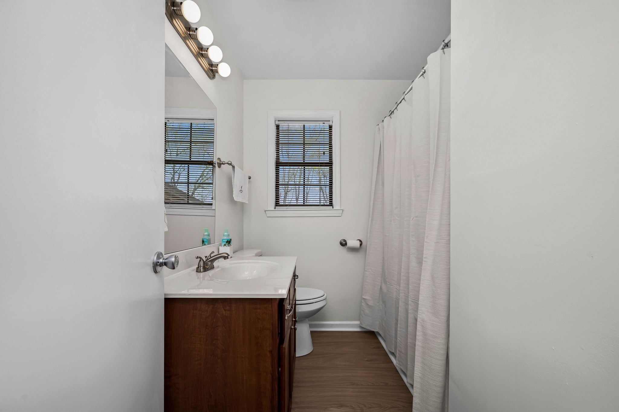 210 Sunset Street Unionville, TN 37180 - Photo 27 of 48 a bathroom with a sink and a mirror