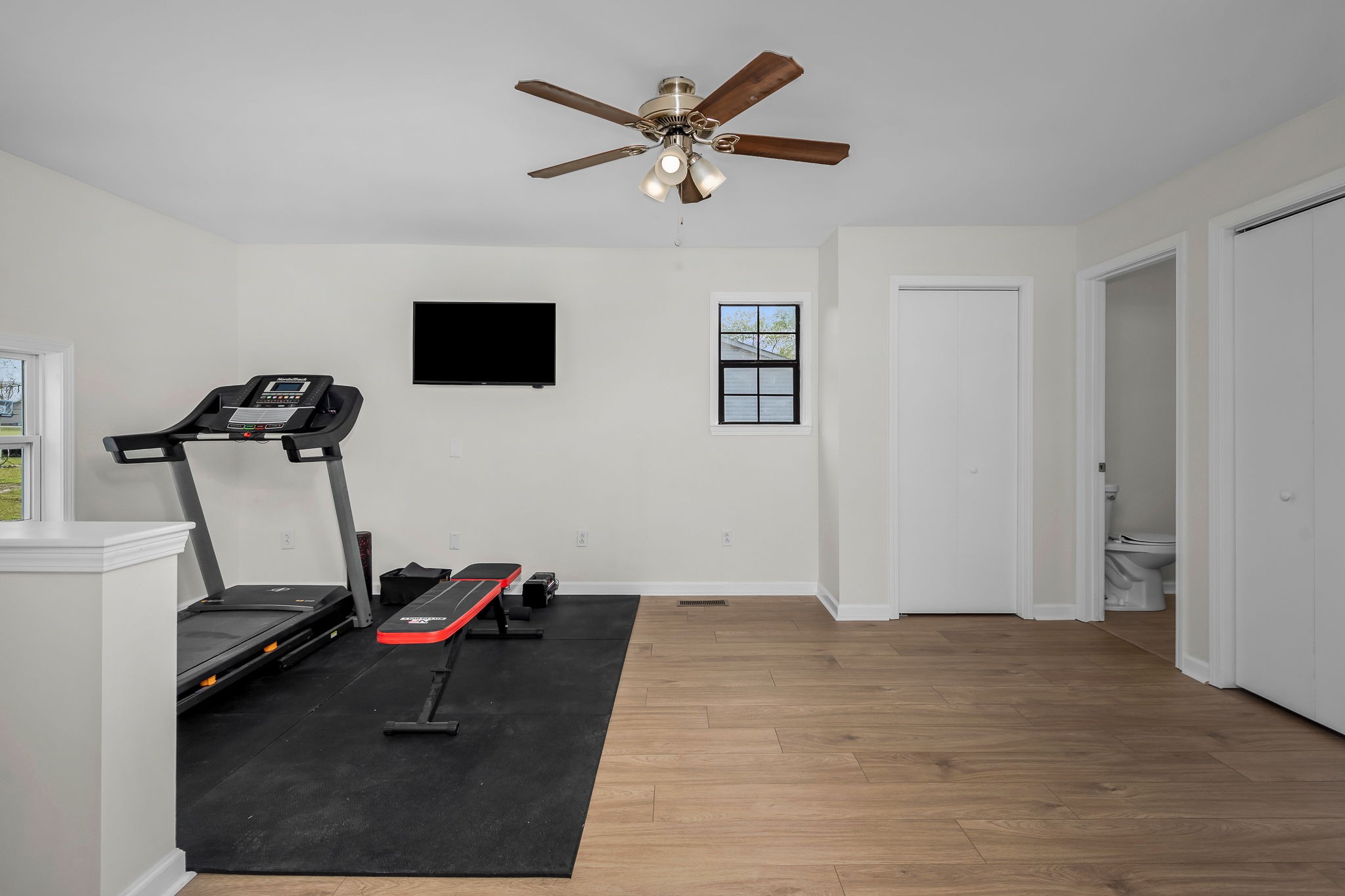 210 Sunset Street Unionville, TN 37180 - Photo 29 of 48 a work room with furniture and a ceiling fan