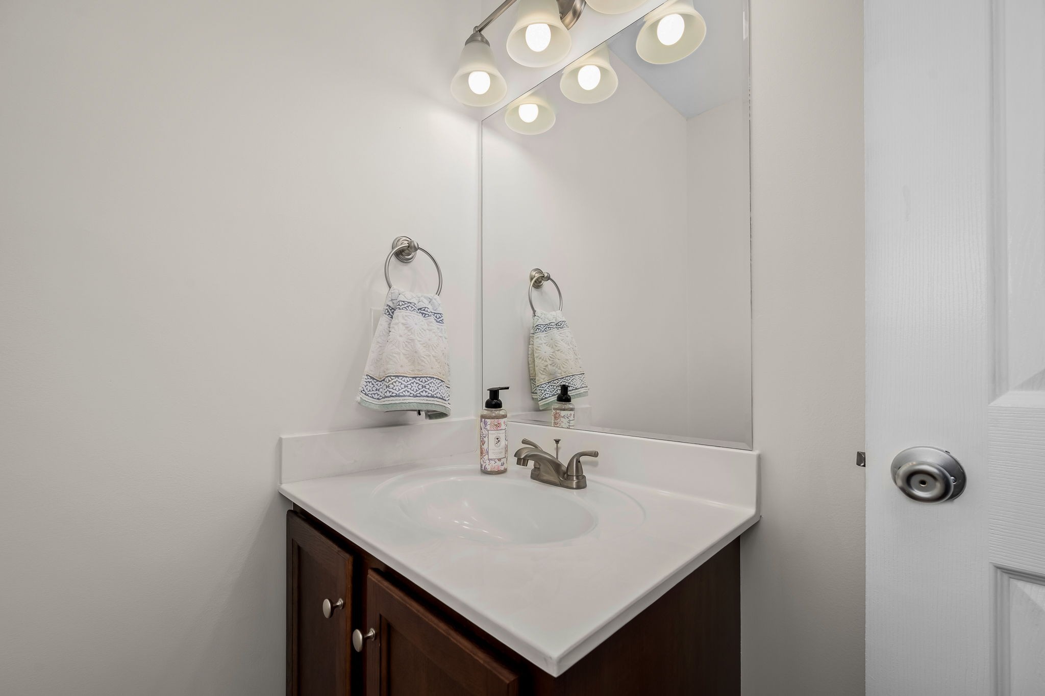210 Sunset Street Unionville, TN 37180 - Photo 35 of 48 a bathroom with a sink vanity and a mirror
