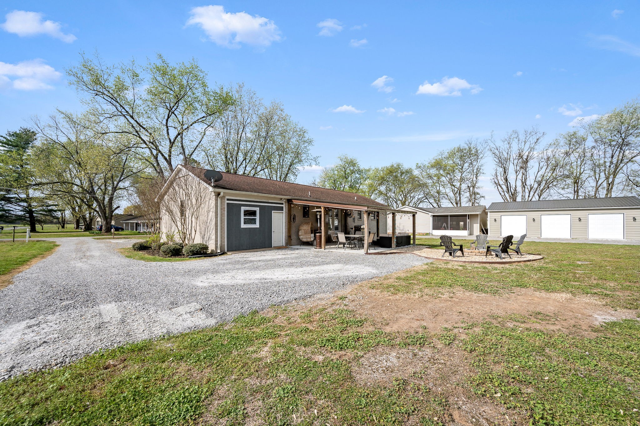 210 Sunset Street Unionville, TN 37180 - Photo 41 of 48 a front view of a house with a yard and garage