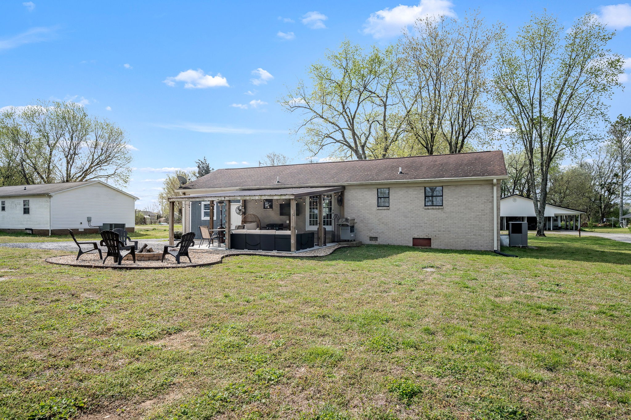 210 Sunset Street Unionville, TN 37180 - Photo 45 of 48 a view of a house with swimming pool and sitting area