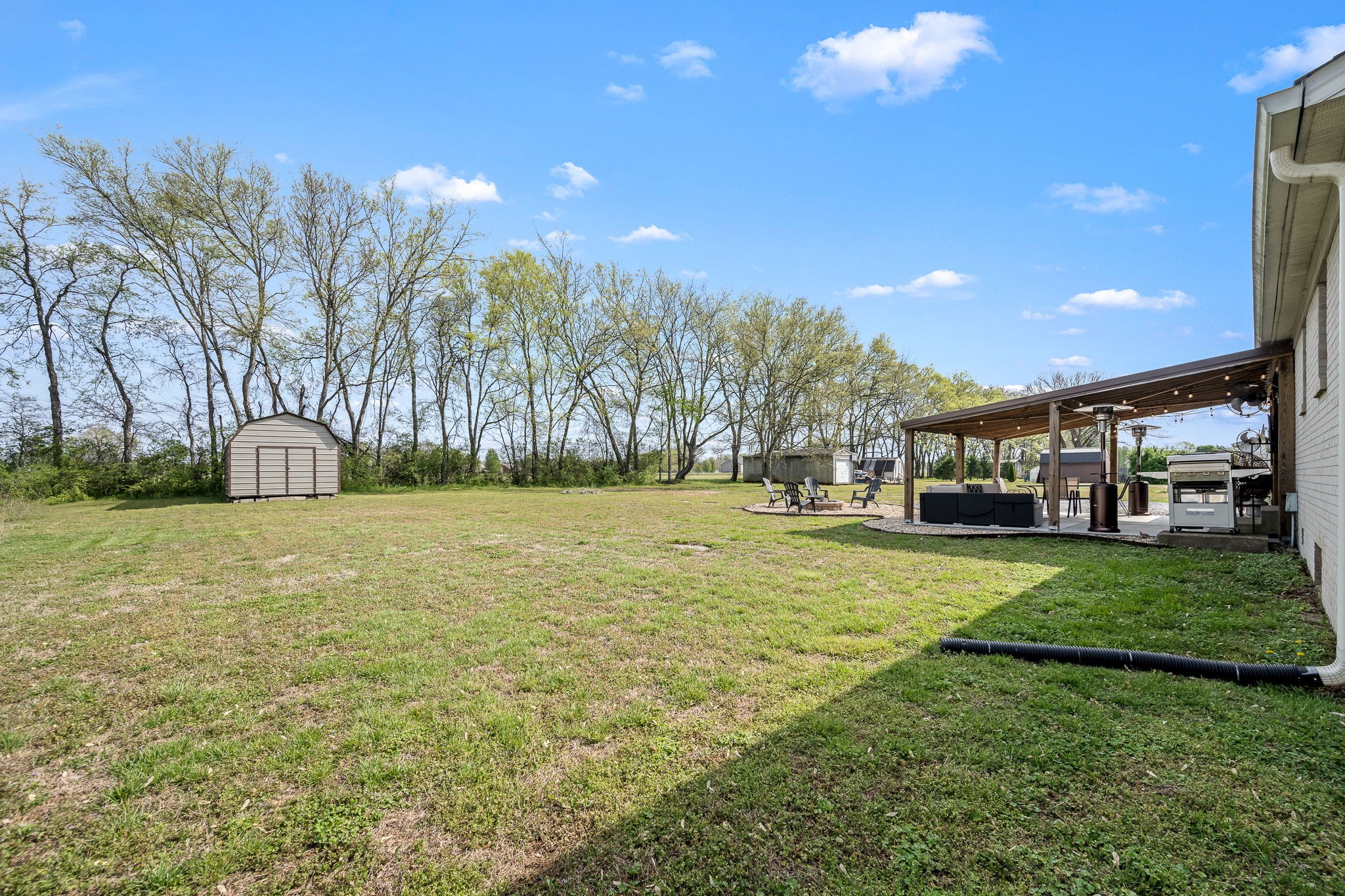 210 Sunset Street Unionville, TN 37180 - Photo 46 of 48 a view of outdoor space with garden and trees