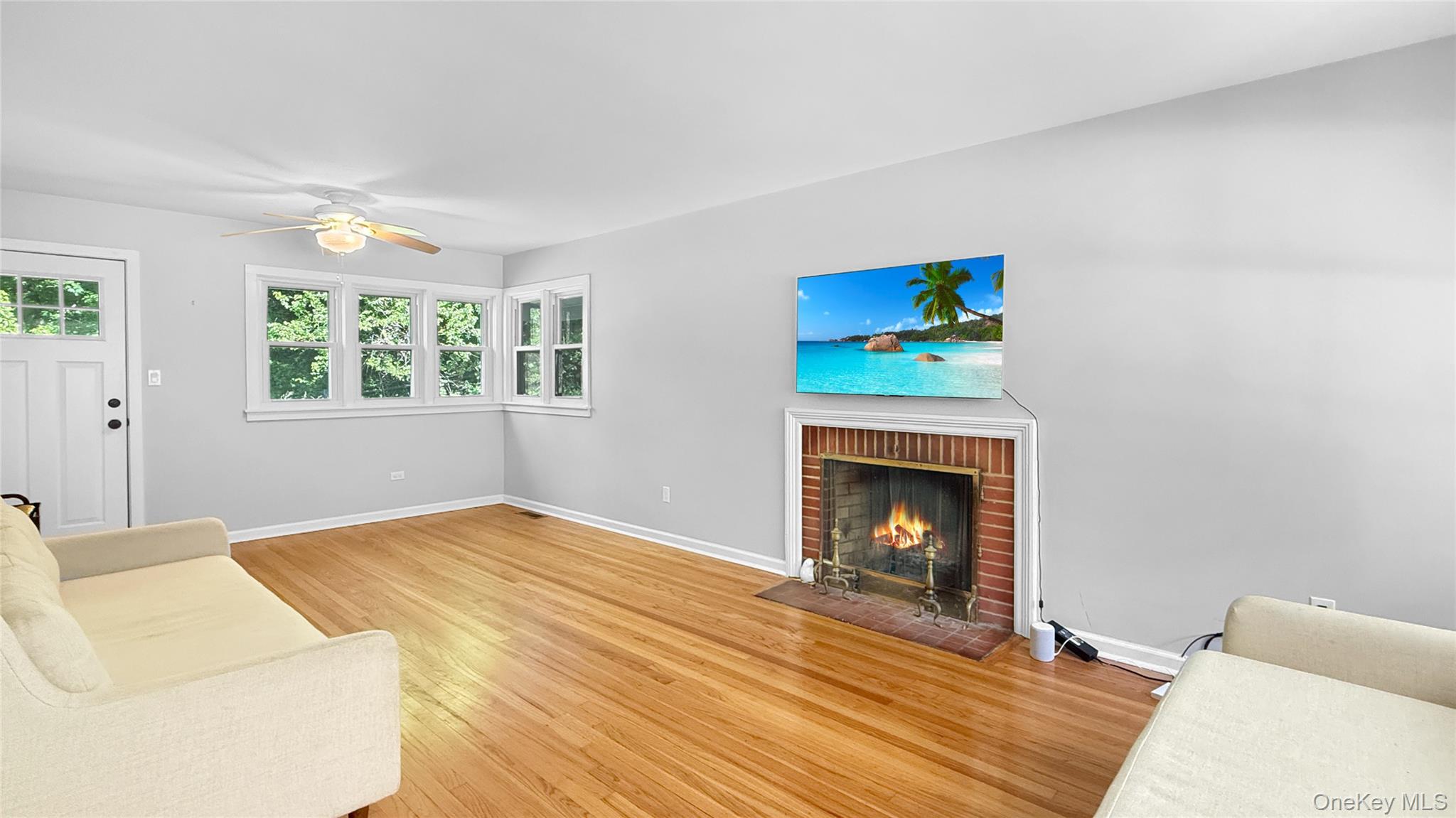 15 Whitehill Place Cold Spring, NY 10516 - Photo 3 of 12 a bedroom with a bed and a fireplace