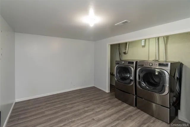 a utility room with dryer and washer