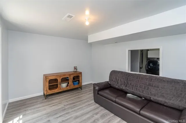 a living room with a couch and a couch