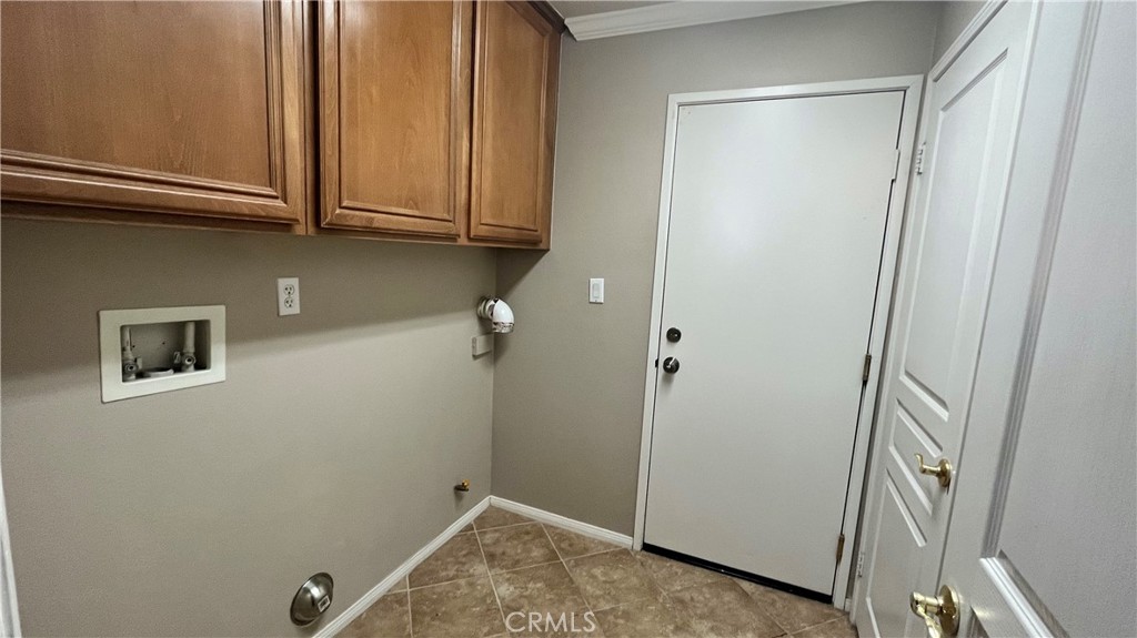 7701 Chambray Place, Unit 2 Rancho Cucamonga, CA 91739 - Photo 27 of 39 a view of room with washer and dryer