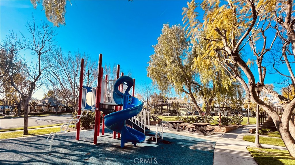 7701 Chambray Place, Unit 2 Rancho Cucamonga, CA 91739 - Photo 37 of 39 a view of a swimming pool with a slide