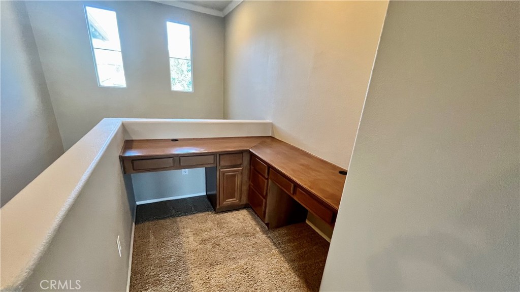 7701 Chambray Place, Unit 2 Rancho Cucamonga, CA 91739 - Photo 10 of 39 a room with storage and utility