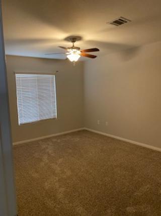 4403 Edam Street Lancaster, CA 93536 - Photo 15 of 20 an empty room with windows and fan