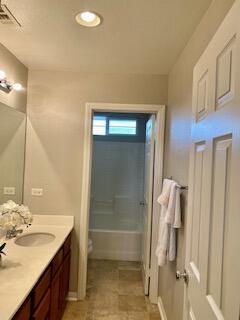4403 Edam Street Lancaster, CA 93536 - Photo 8 of 20 a bathroom with a sink and a mirror