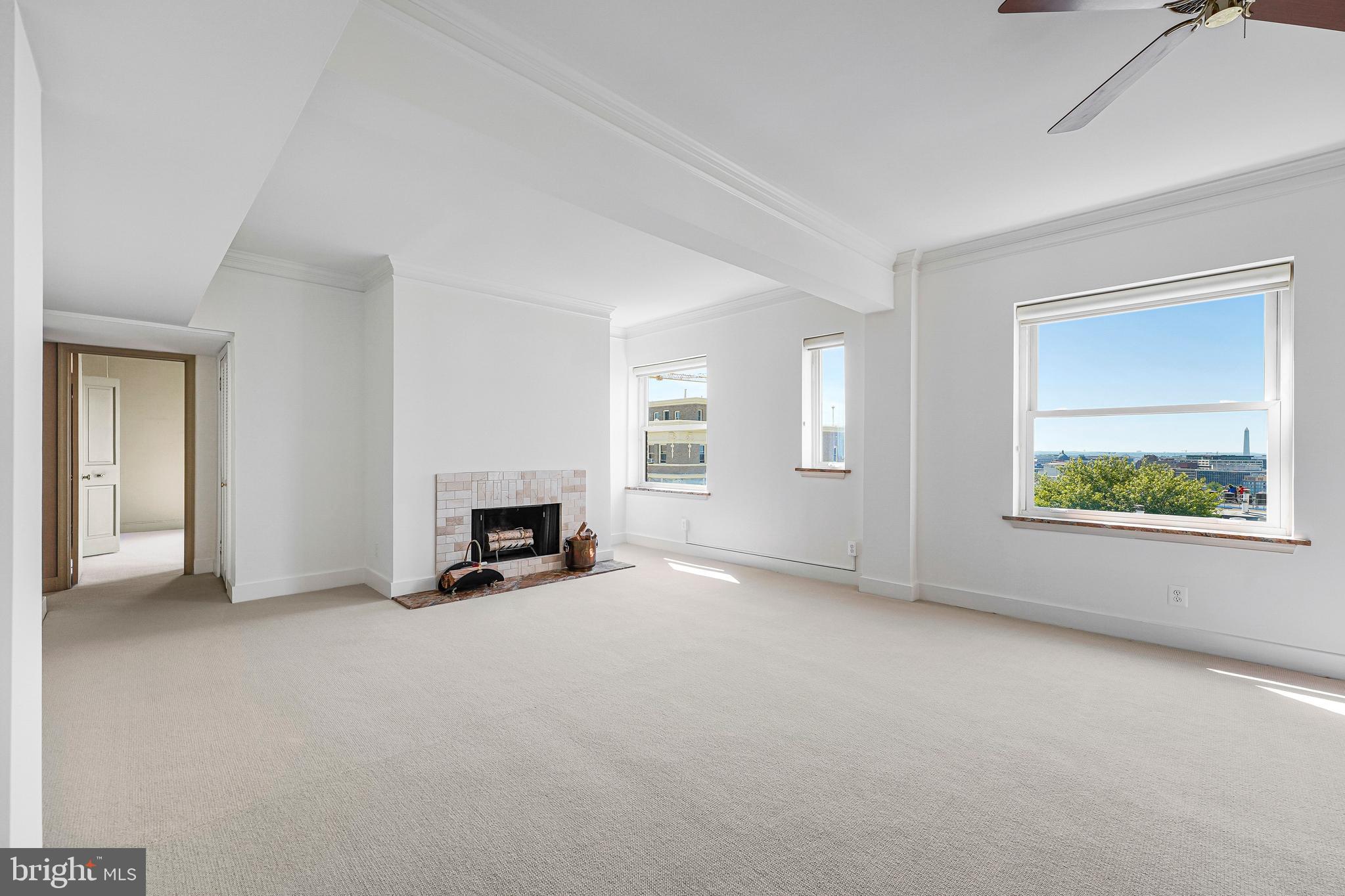 2127 California Street Northwest, Unit 704 Washington, DC 20008 - Photo 8 of 27 Living room with fireplace