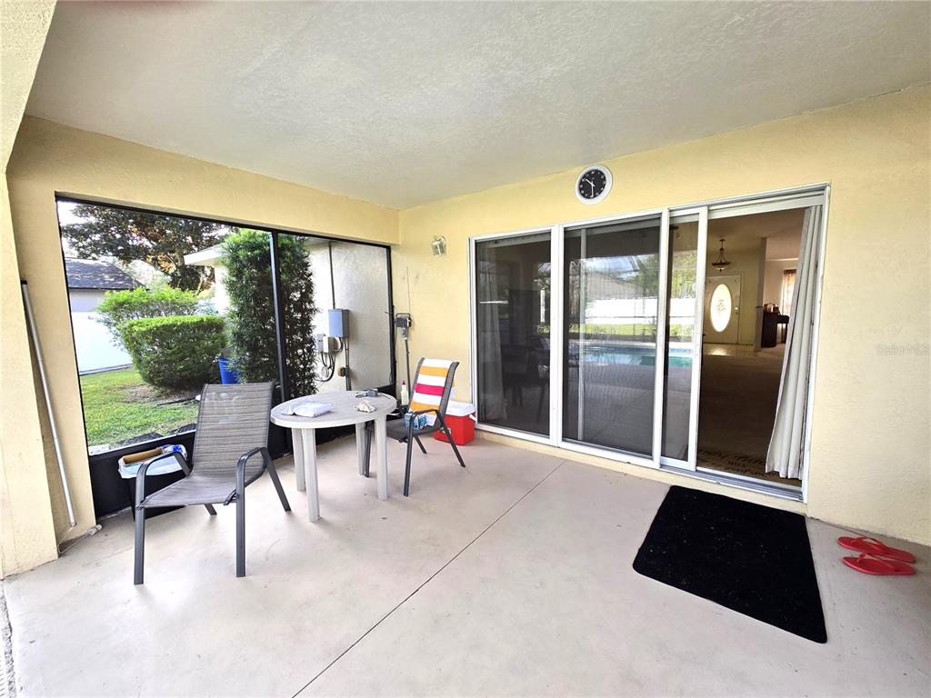 4300 Northwest 4th Circle Ocala, FL 34475 - Photo 23 of 34 a living room with furniture and a large window