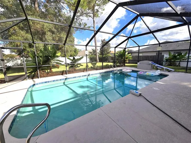 a view of yard with a patio