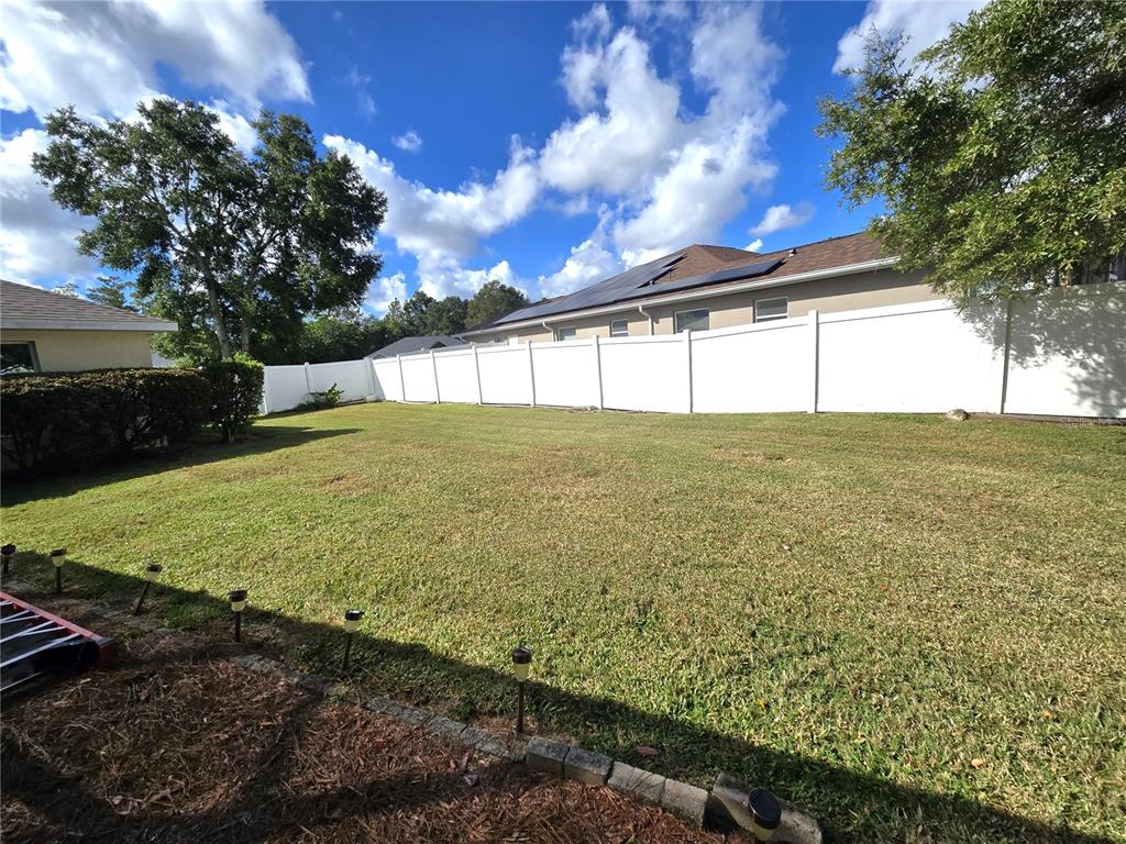 4300 Northwest 4th Circle Ocala, FL 34475 - Photo 29 of 34 a view of an outdoor space and yard