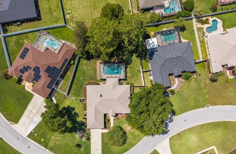 4300 Northwest 4th Circle Ocala, FL 34475 - Photo 32 of 34 an aerial view of a house with a swimming pool
