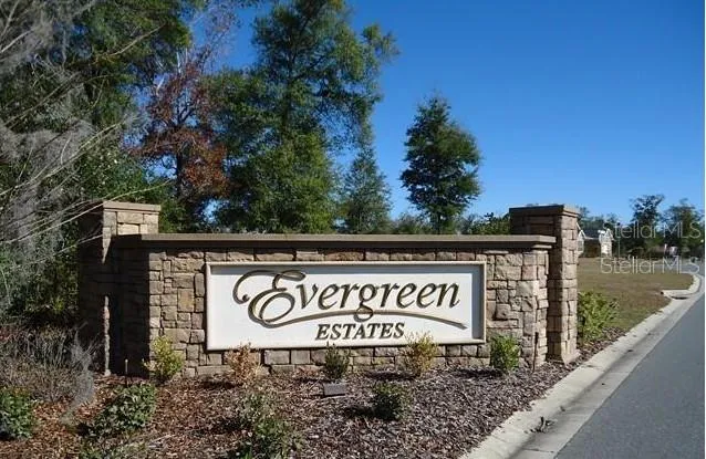 a sign broad on the side of a road