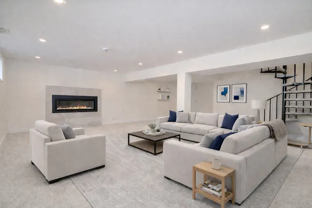 a living room with furniture and a couch