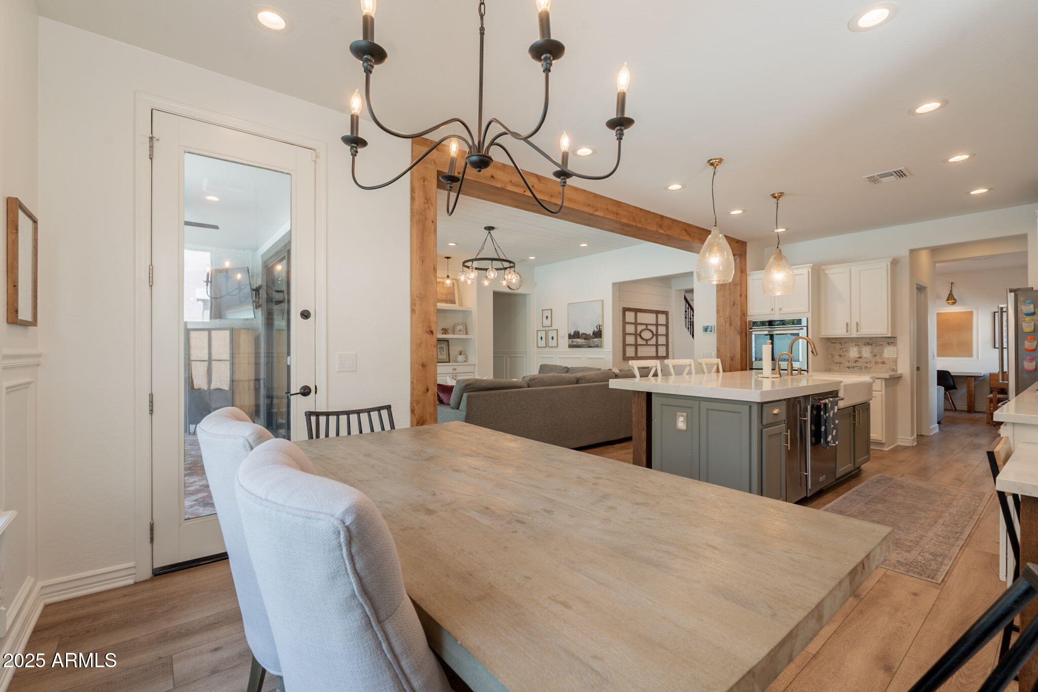 3931 East Weather Vane Road Gilbert, AZ 85296 - Photo 17 of 83 a large kitchen with a table and chairs