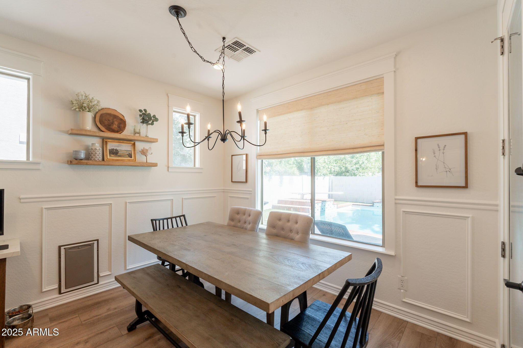 3931 East Weather Vane Road Gilbert, AZ 85296 - Photo 18 of 83 a view of a dining room with furniture window and wooden floor