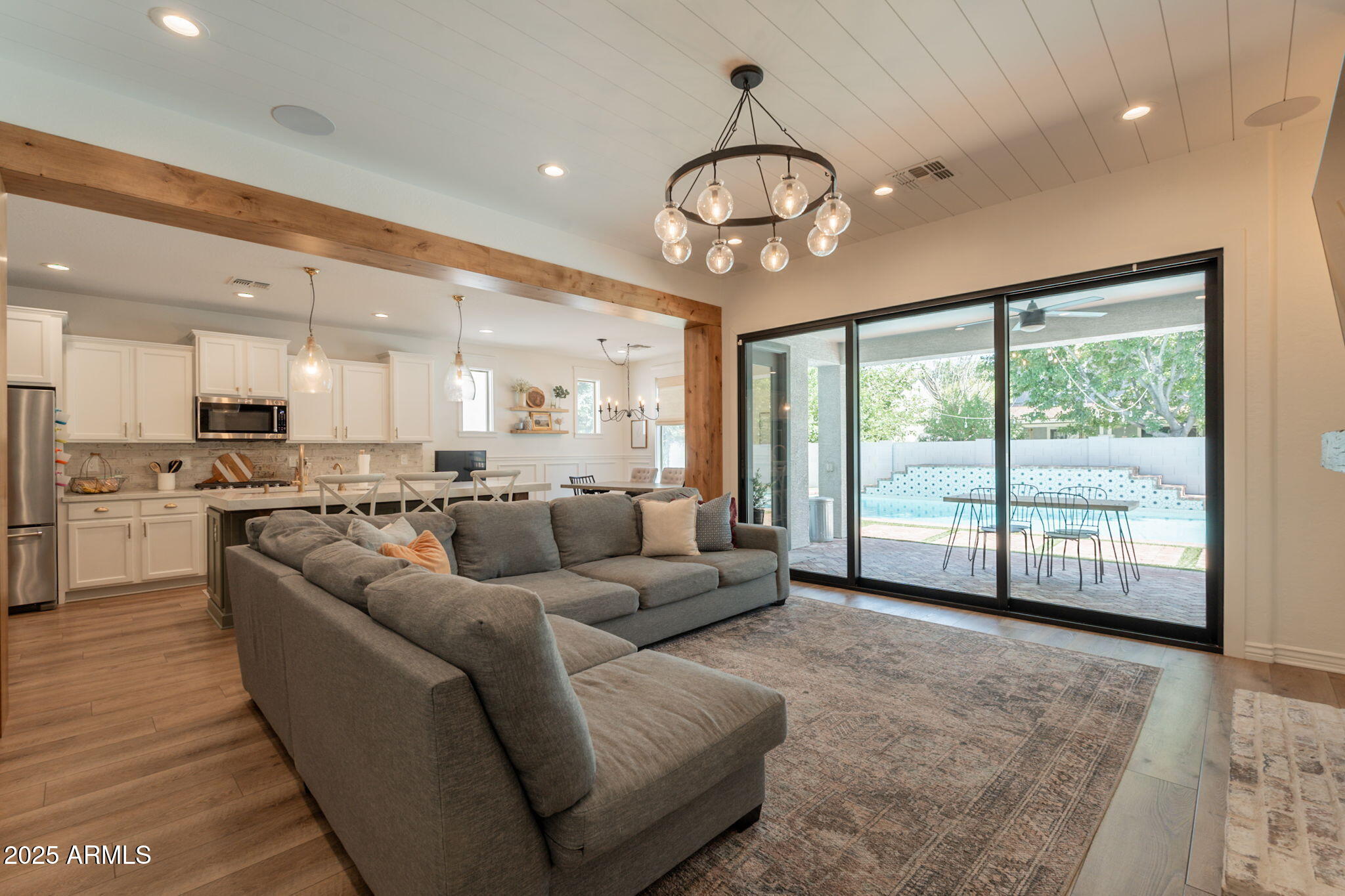 3931 East Weather Vane Road Gilbert, AZ 85296 - Photo 30 of 83 a living room with furniture and a large window