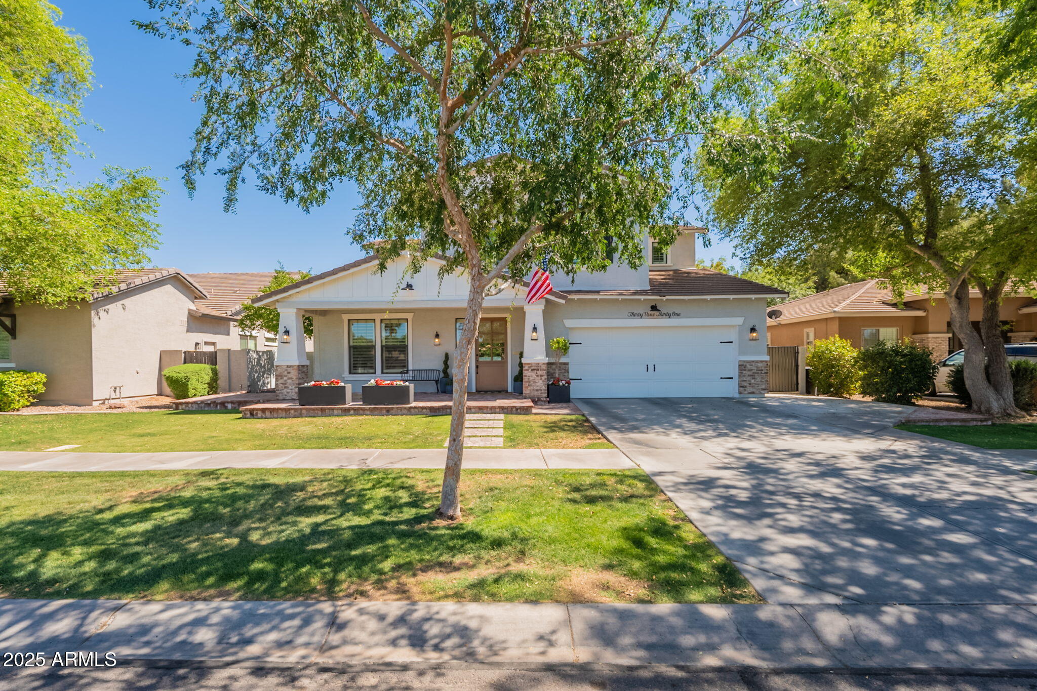 3931 East Weather Vane Road Gilbert, AZ 85296 - Photo 3 of 83 a front view of a house with swimming pool