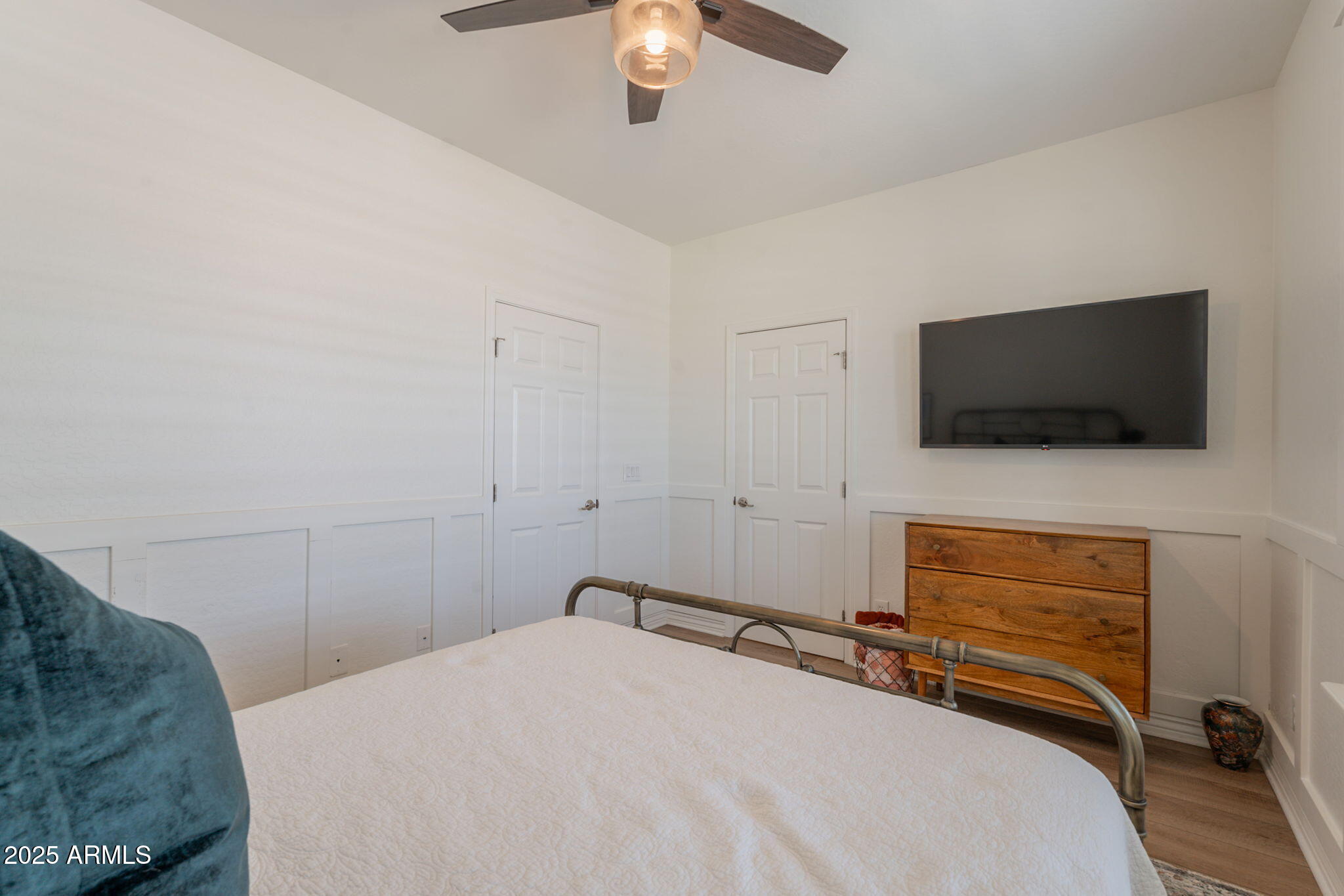 3931 East Weather Vane Road Gilbert, AZ 85296 - Photo 39 of 83 a bedroom with a bed and a flat screen tv
