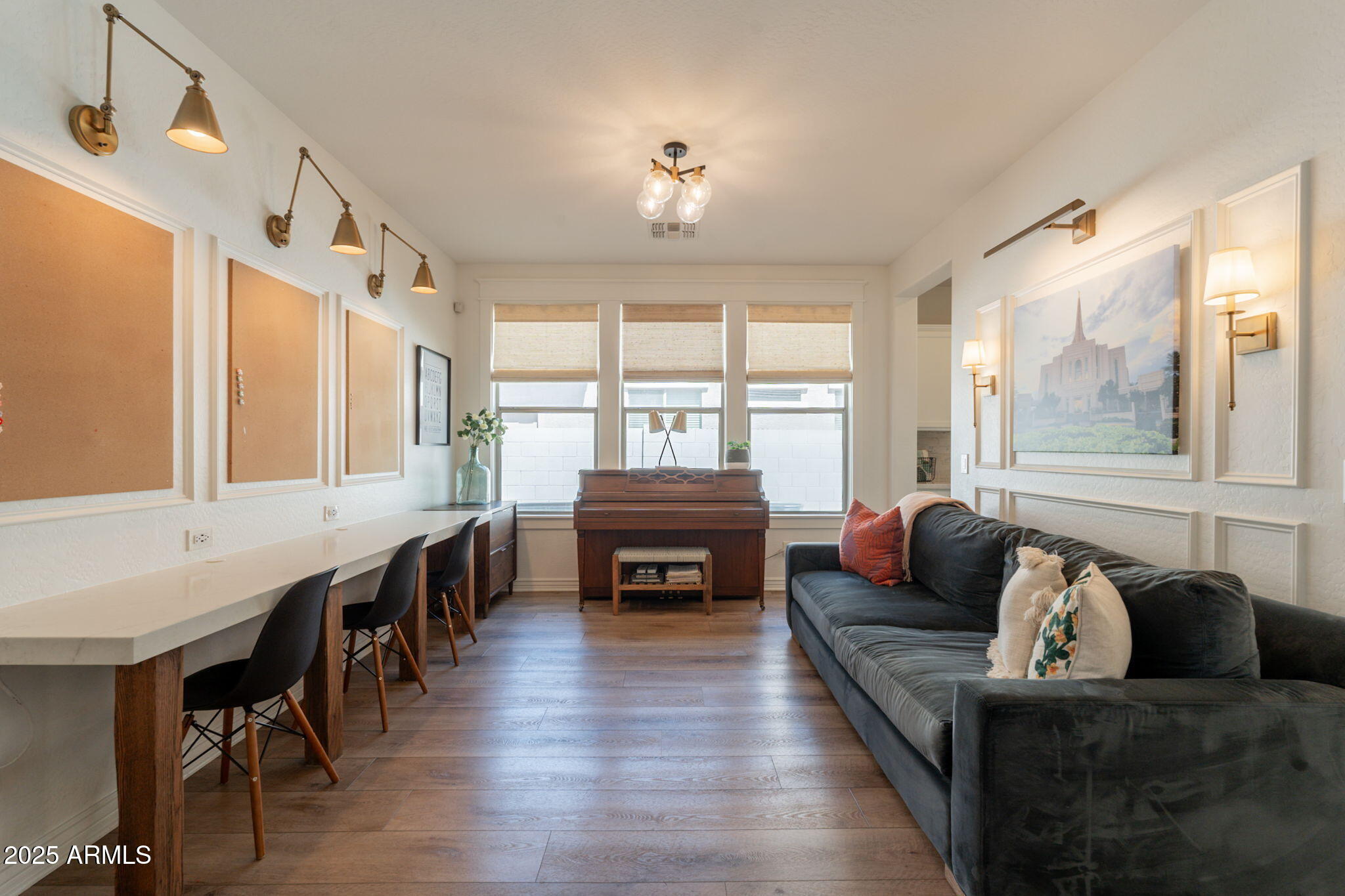 3931 East Weather Vane Road Gilbert, AZ 85296 - Photo 40 of 83 a living room with furniture and a flat screen tv