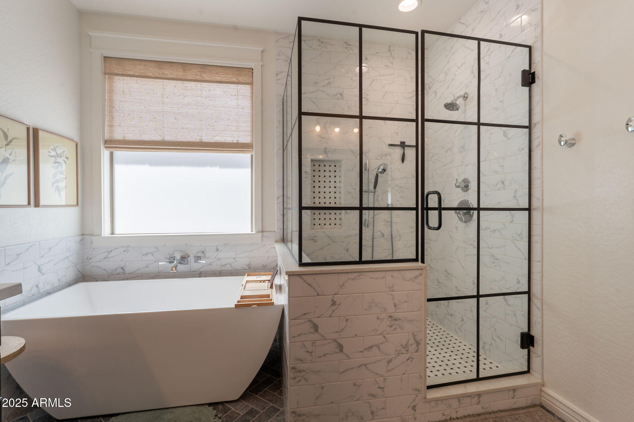 3931 East Weather Vane Road Gilbert, AZ 85296 - Photo 60 of 83 a bathroom with a bathtub and next to a window