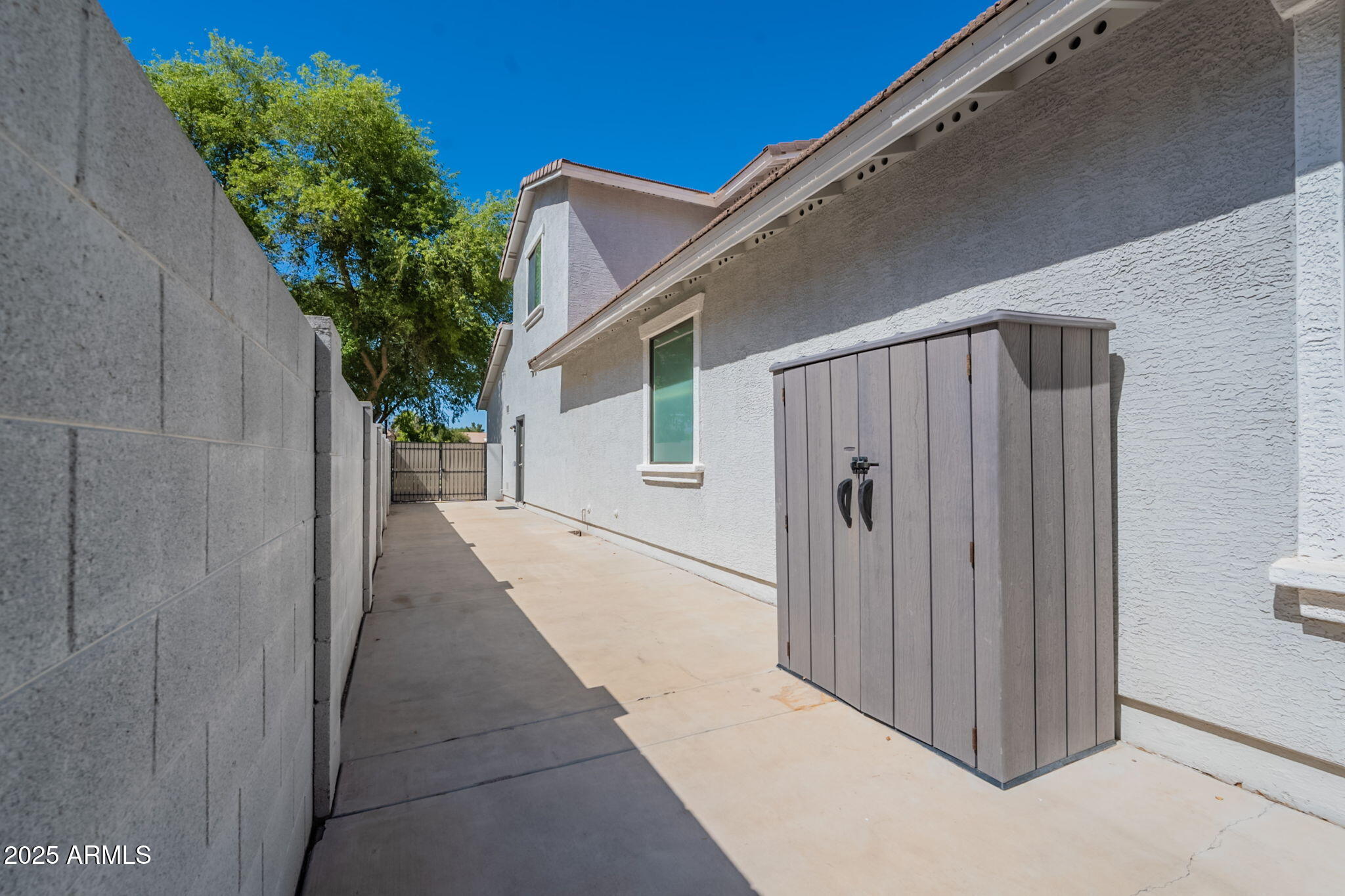 3931 East Weather Vane Road Gilbert, AZ 85296 - Photo 72 of 83 a view of a house with a backyard