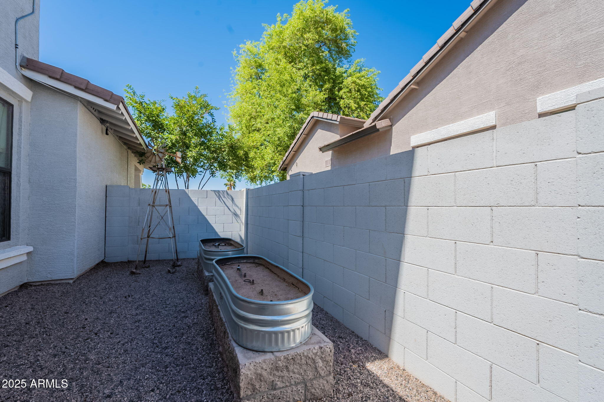 3931 East Weather Vane Road Gilbert, AZ 85296 - Photo 76 of 83 a front view of a house with garden