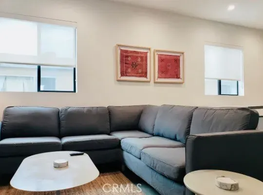 a living room with furniture and a couch