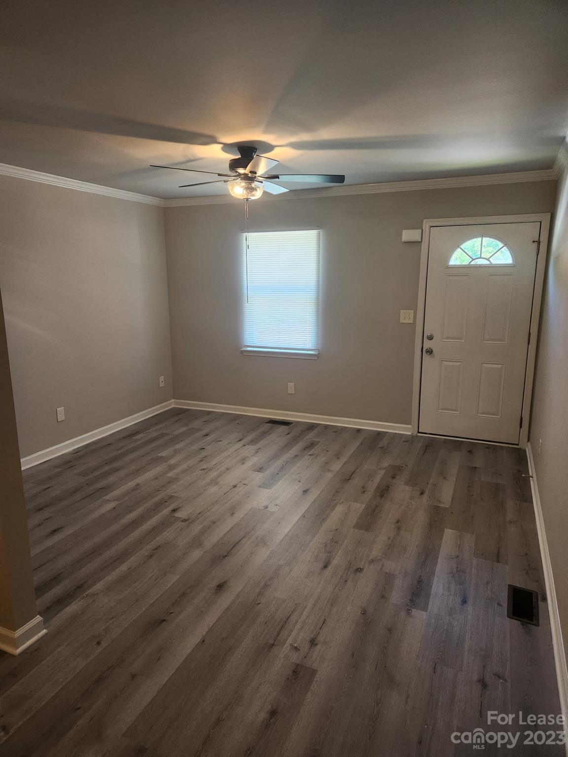 215 North Long Street, Unit B Salisbury, NC 28144 - Photo 5 of 5 wooden floor in an empty room