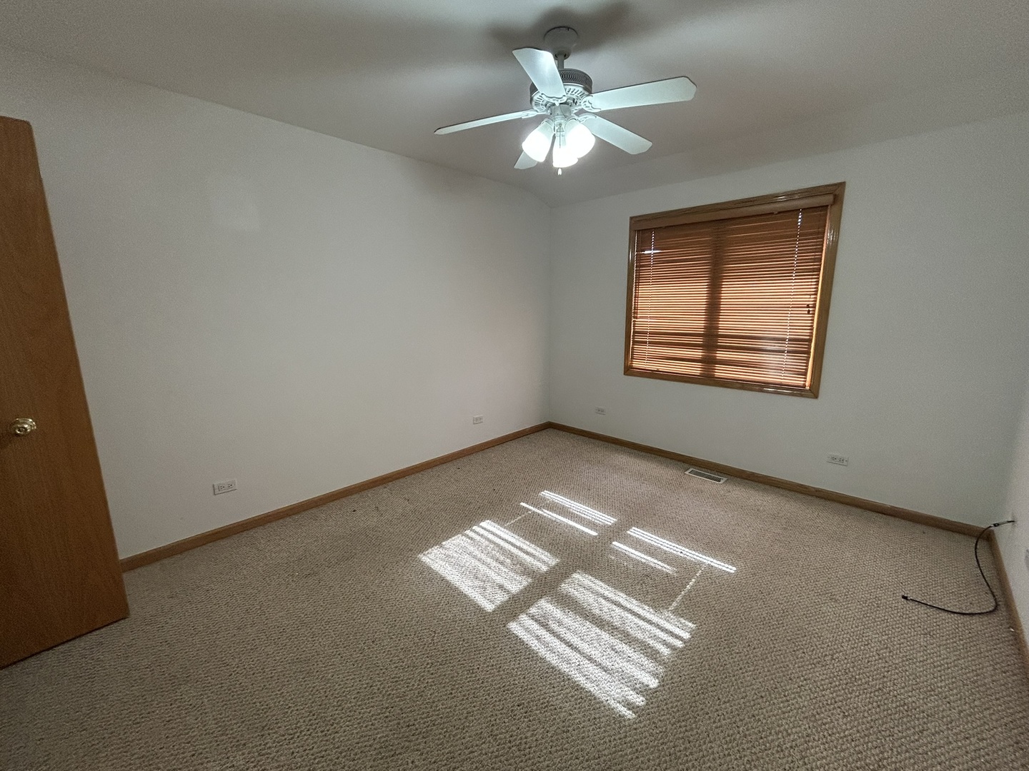 9207 Gerritsen Avenue, Unit 9207 Brookfield, IL 60513 - Photo 22 of 24 a view of an empty room with a window