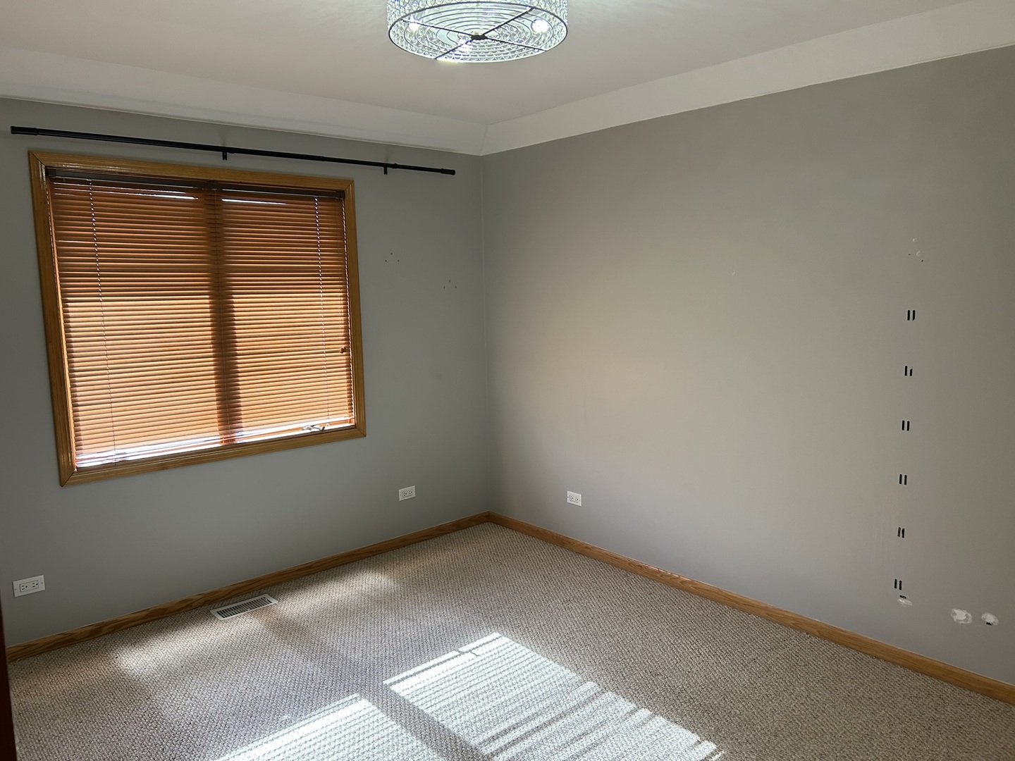 9207 Gerritsen Avenue, Unit 9207 Brookfield, IL 60513 - Photo 23 of 24 a view of an empty room with a window