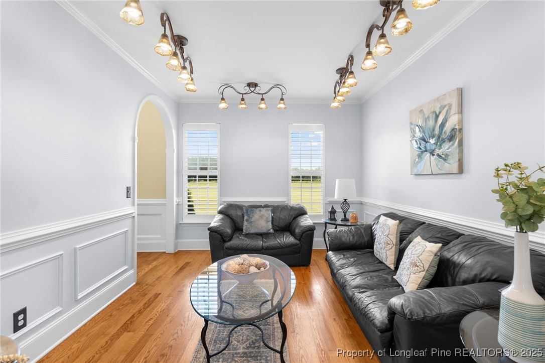 499 Price Road Fairmont, NC 28340 - Photo 16 of 50 a living room with furniture and a chandelier