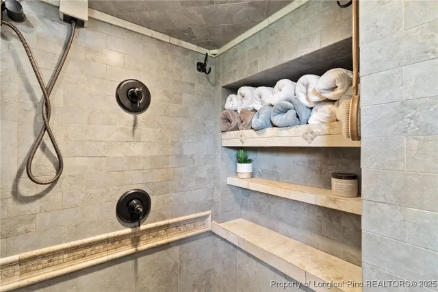 a bathroom with a sink and a shower