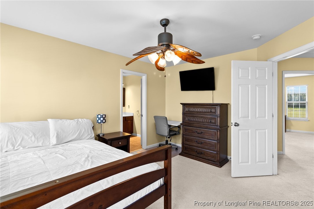 499 Price Road Fairmont, NC 28340 - Photo 27 of 50 a bedroom with a bed and a television