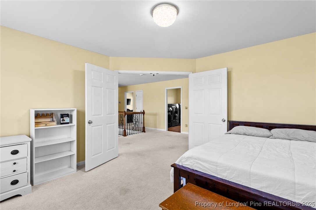 499 Price Road Fairmont, NC 28340 - Photo 28 of 50 a bedroom with a bed and cabinets