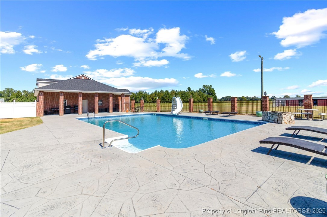 499 Price Road Fairmont, NC 28340 - Photo 40 of 50 a view of a house with swimming pool