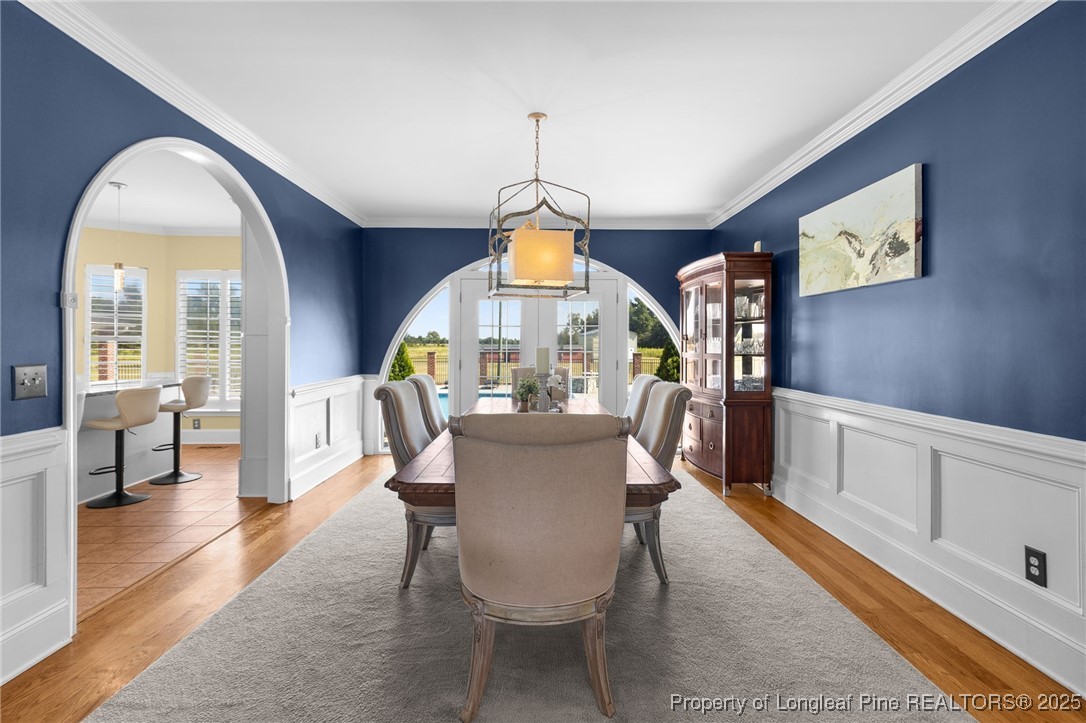 499 Price Road Fairmont, NC 28340 - Photo 8 of 50 a view of a dining room with furniture window and wooden floor