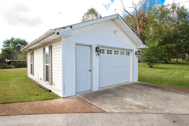 a view of a back yard of the house