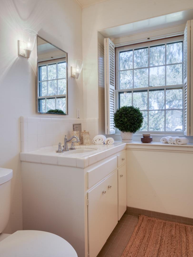 150 Littlefield Road Monterey, CA 93940 - Photo 17 of 51 a bathroom with a sink and a window