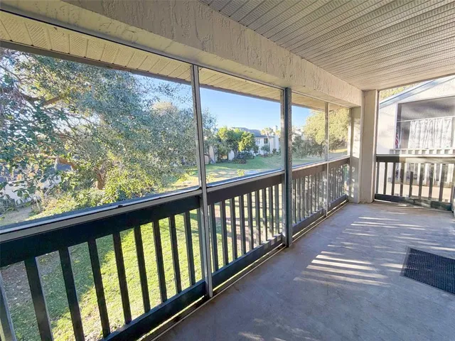 a view of swimming pool with seating area