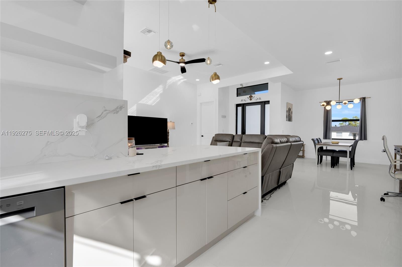 2250 10th Terrace Lehigh Acres, FL 33936 - Photo 29 of 39 a spacious bathroom with a double vanity sink a mirror and shower