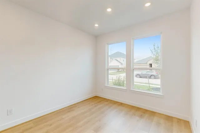 an empty room with windows