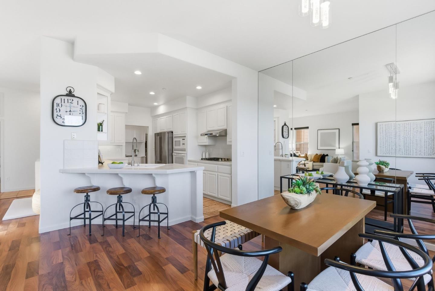 121 Cliff Swallow Court Brisbane, CA 94005 - Photo 13 of 50 a view of a dining room with furniture and wooden floor