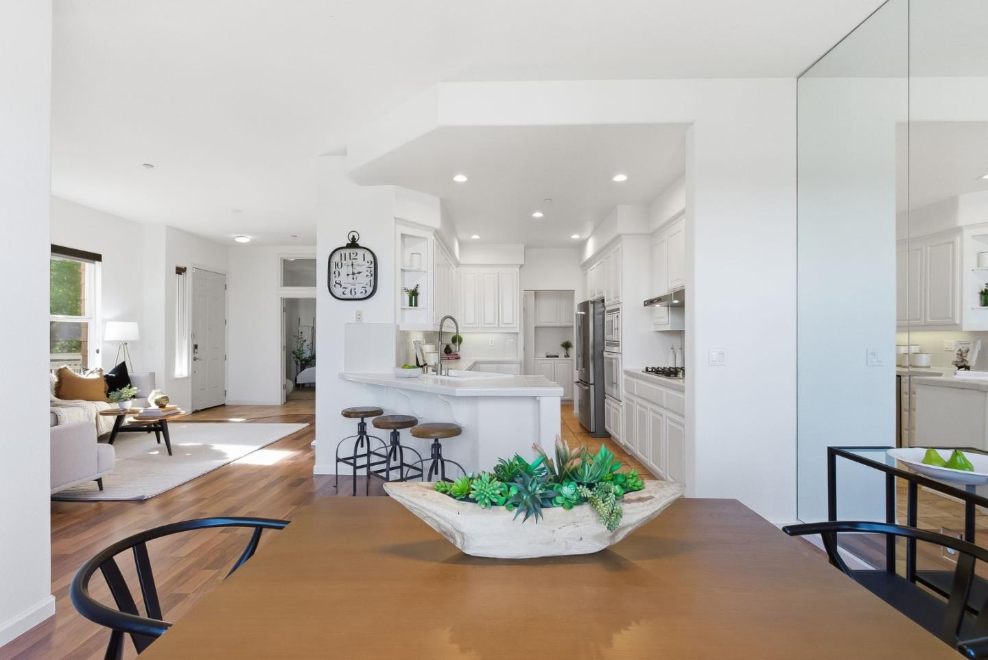 121 Cliff Swallow Court Brisbane, CA 94005 - Photo 14 of 50 a living room with furniture and a dining table