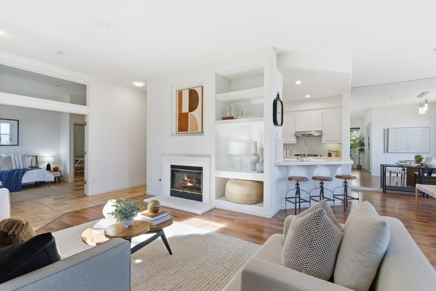 121 Cliff Swallow Court Brisbane, CA 94005 - Photo 2 of 50 a living room with furniture and a fireplace