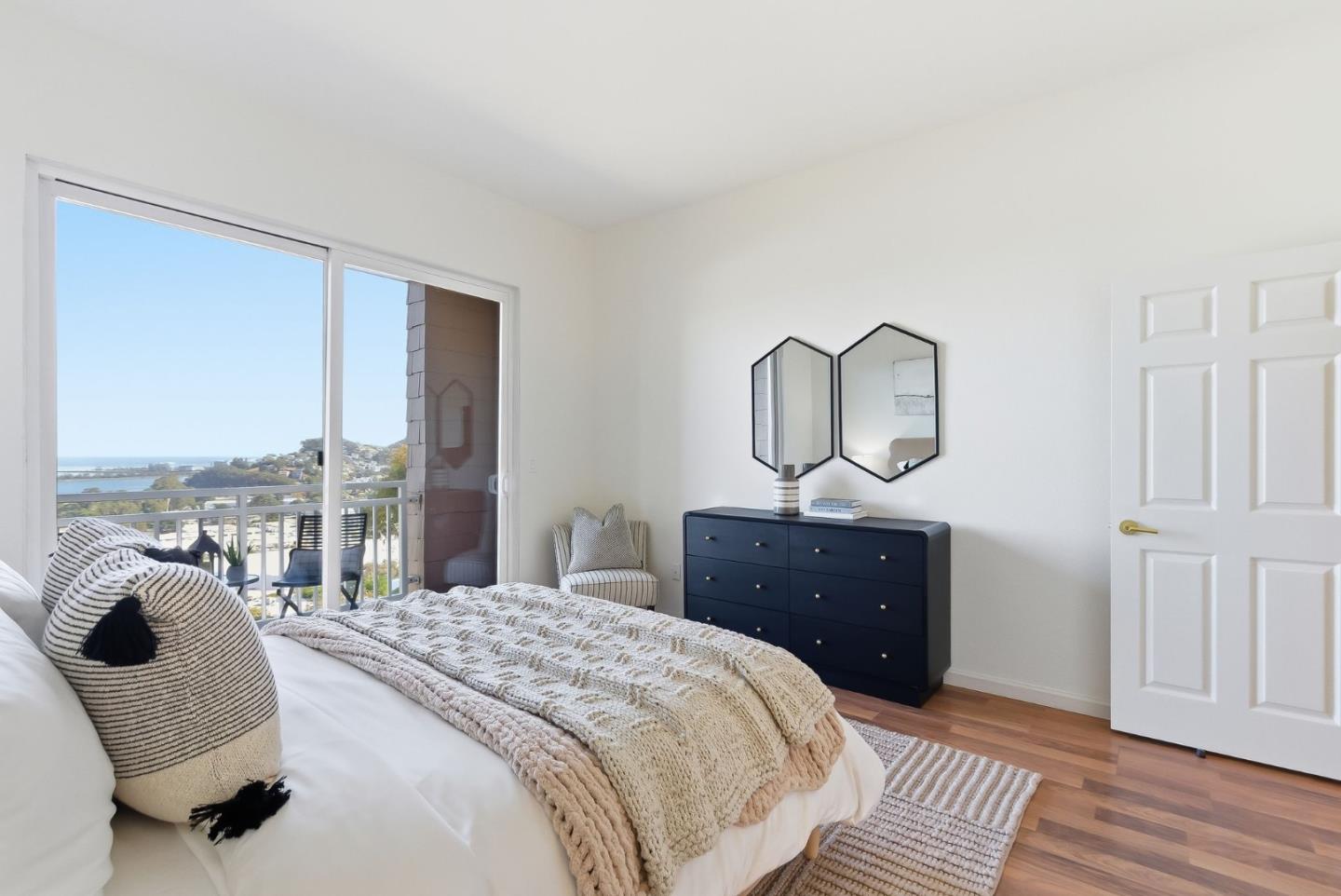 121 Cliff Swallow Court Brisbane, CA 94005 - Photo 23 of 50 a bed room with a bed and a dresser